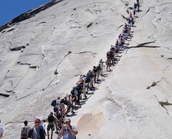 Hikers on the Cables at Half Dome in Yosemite